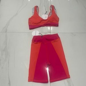 - NWT Kore swim biker set , Orange and pink
